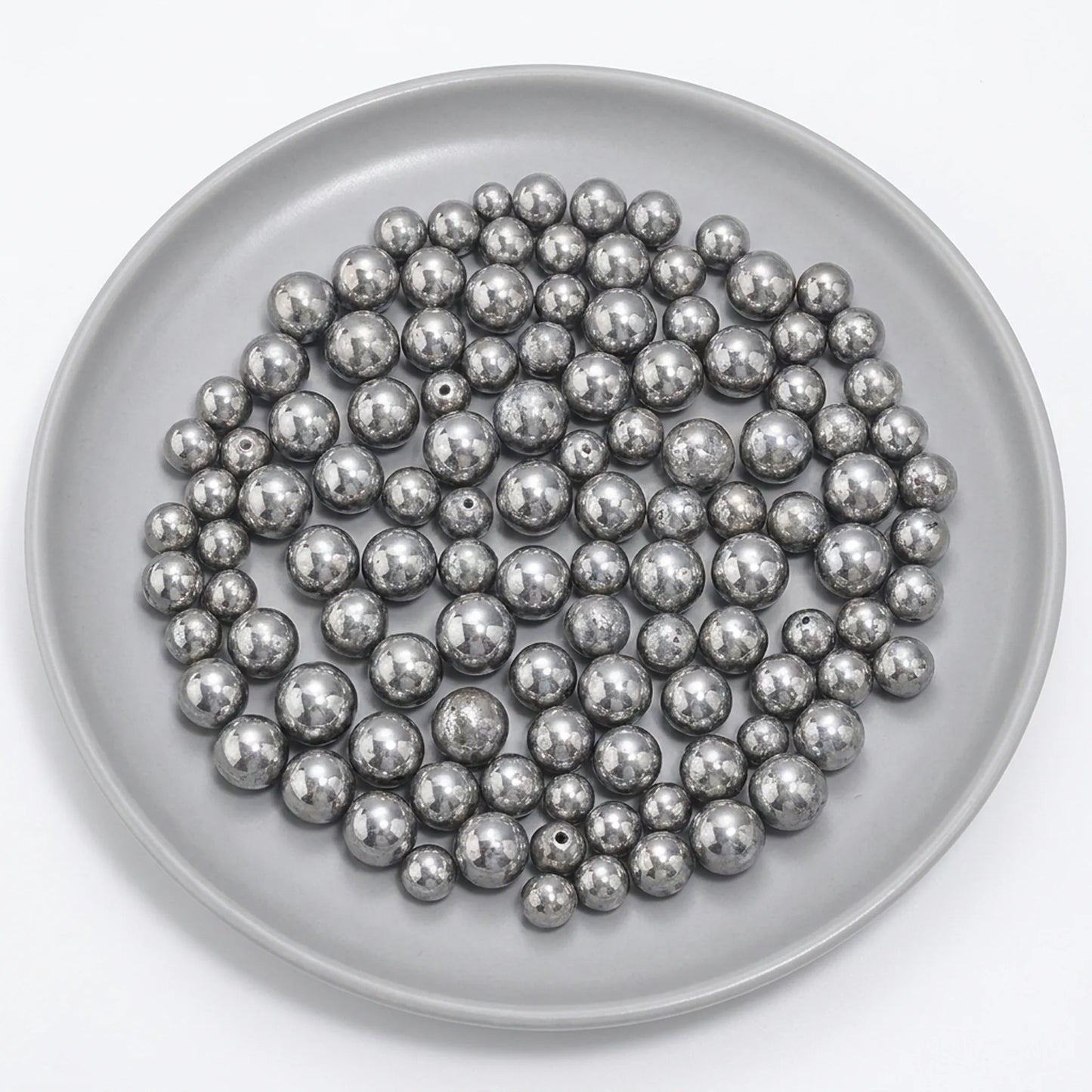 Metallic silver beads for jewelry making projects