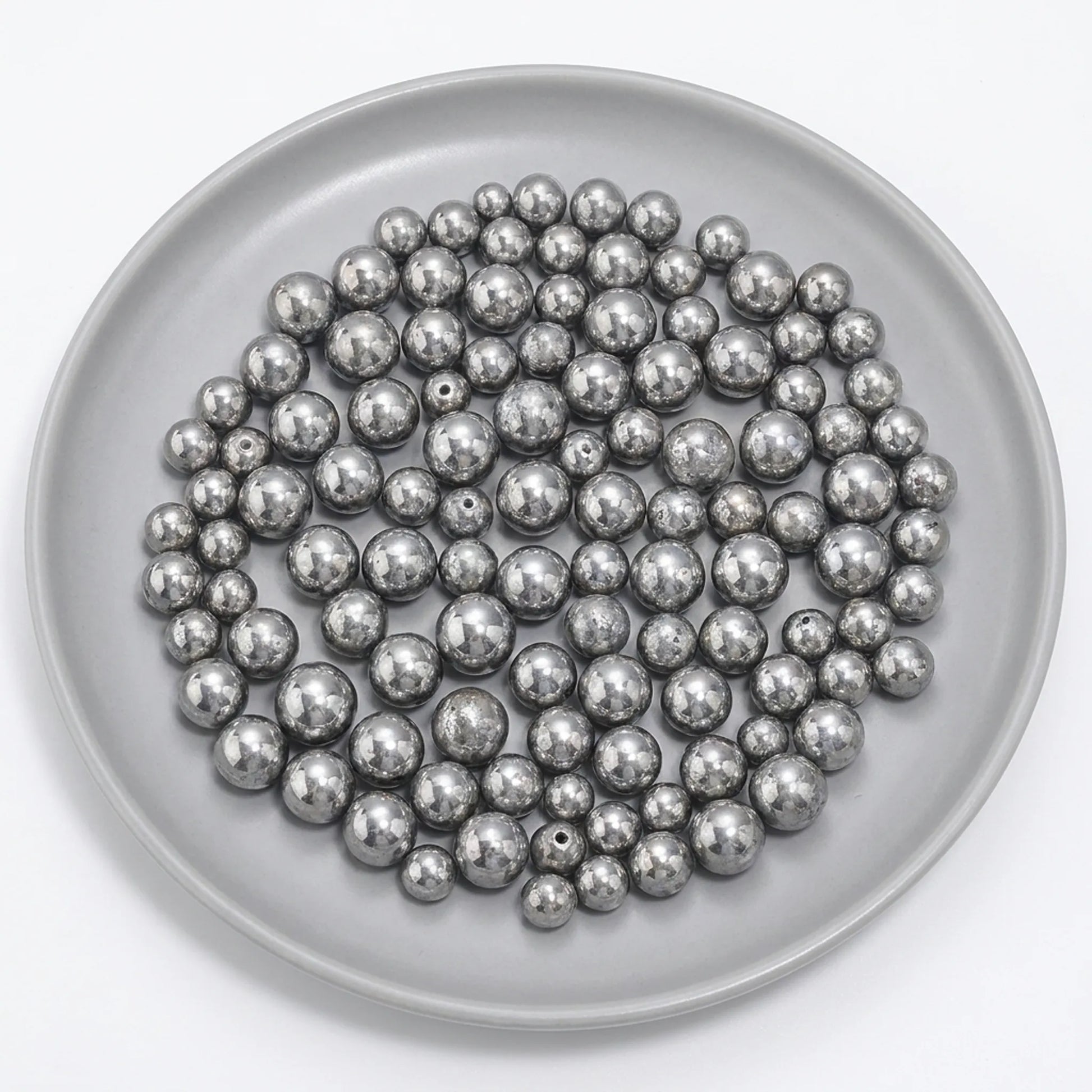 Metallic silver beads for jewelry making projects