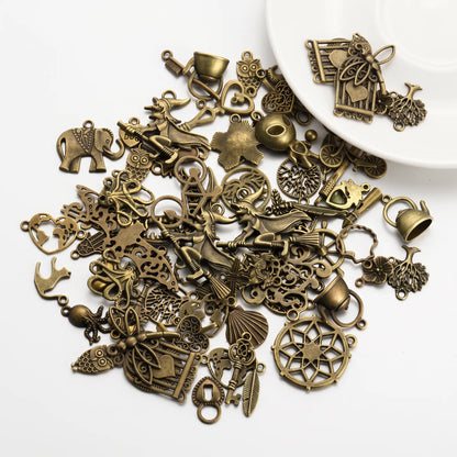 Mixed antique bronze tone charms with animals hearts flowers leaves and decorative motifs
