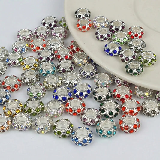 Mixed color rhinestone spacer beads with large holes and silver tone finish