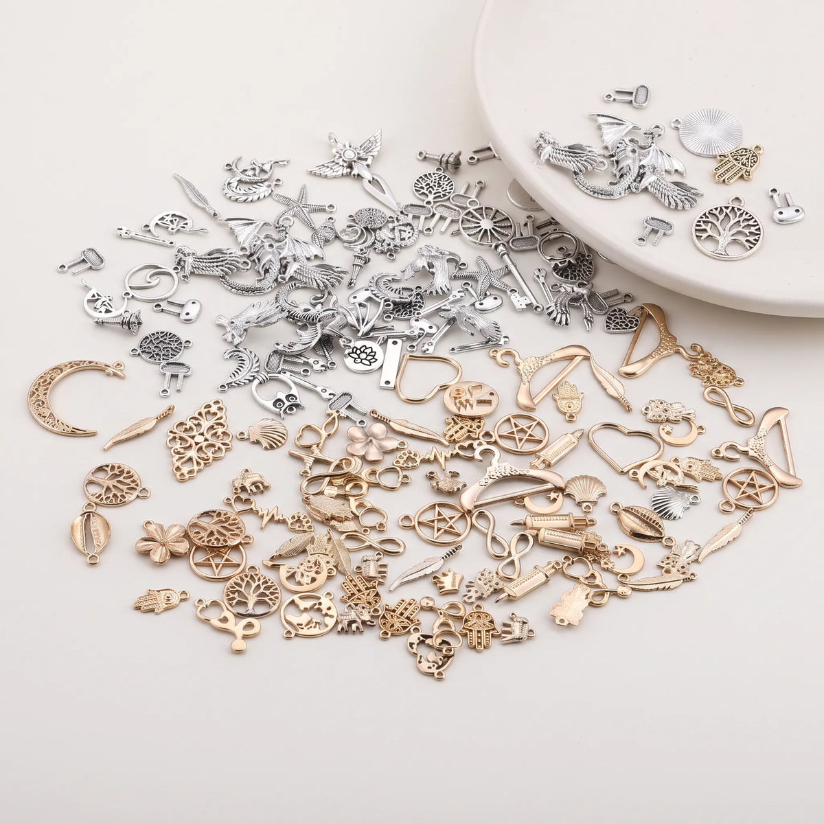 Assorted gold and silver tone metal charms for DIY jewelry making