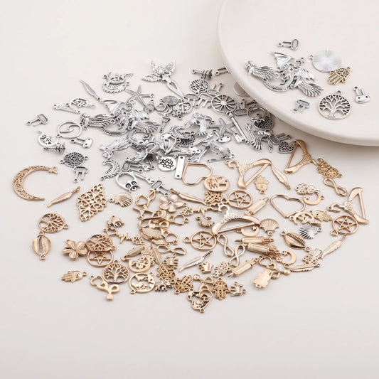 Assorted gold and silver tone metal charms for DIY jewelry making