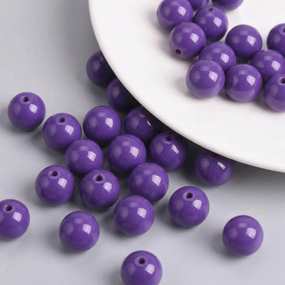Opal purple coated glass round beads with smooth glossy finish and visible holes