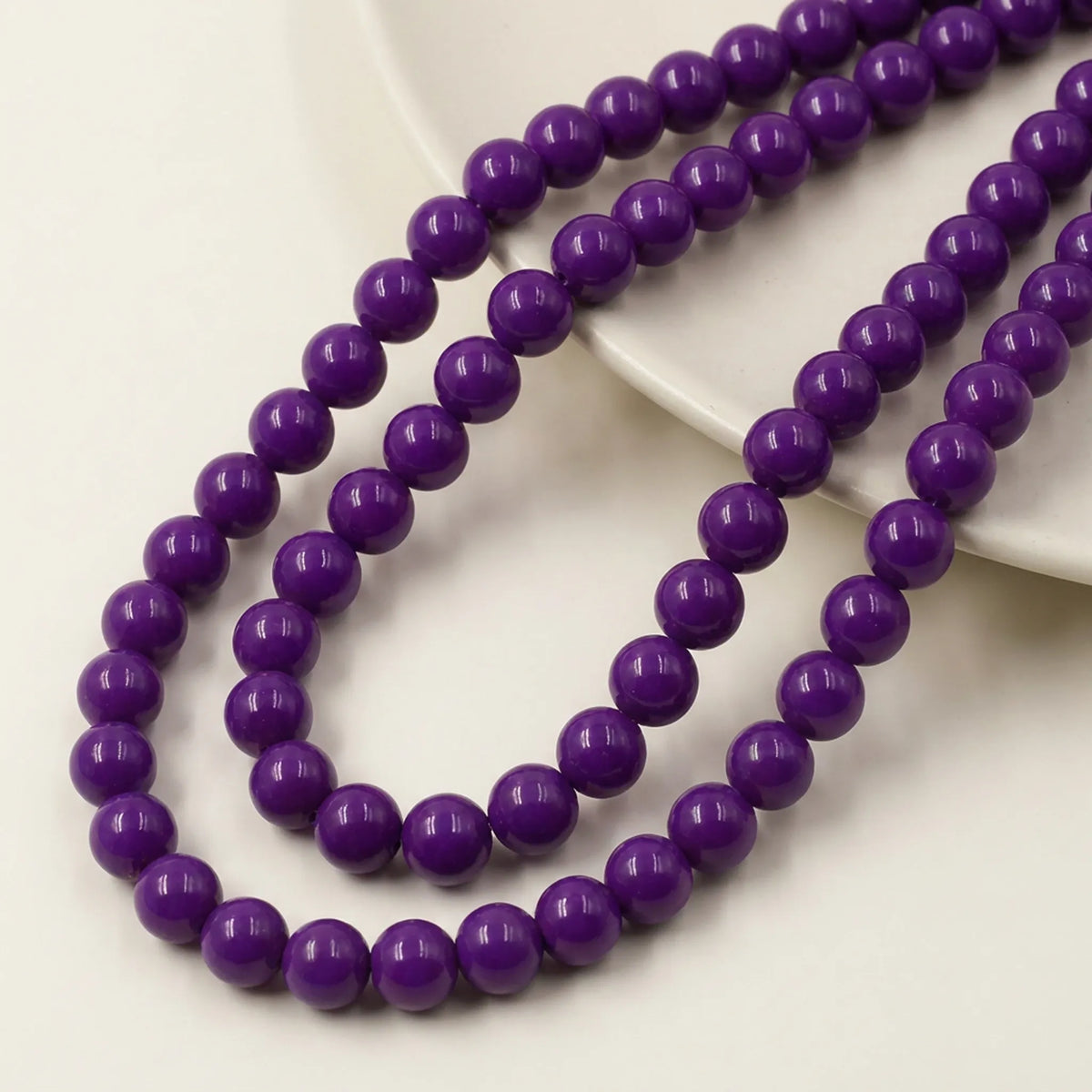 Multiple strands of opal purple coated glass round beads for jewelry making