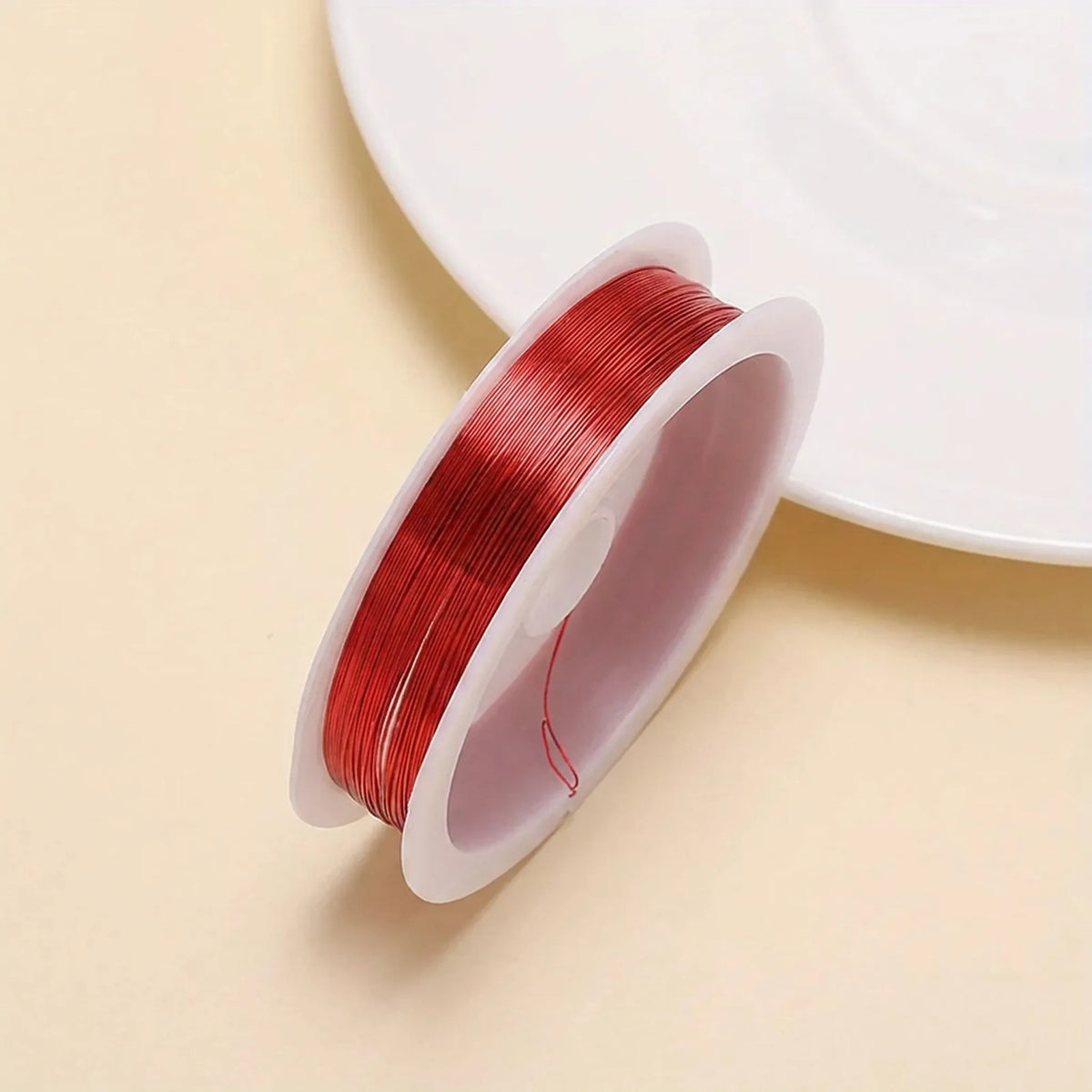 Red colored copper beading wire roll for jewelry making