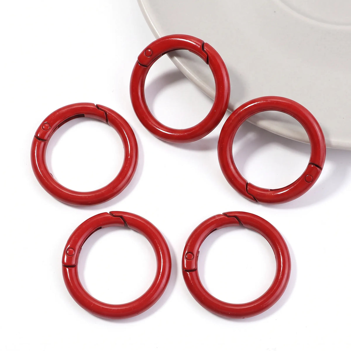 Red metal round carabiner clasps with spring opening