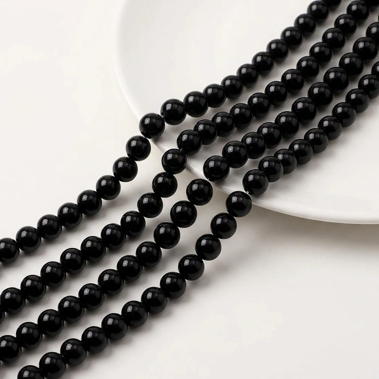 Round black agate beads with smooth surface