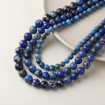 Round dark blue jasper beads with smooth surface