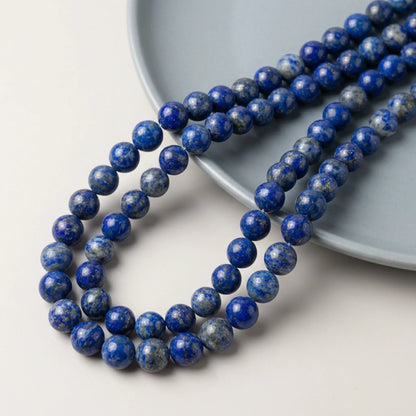 Round lapis lazuli beads with smooth blue surface
