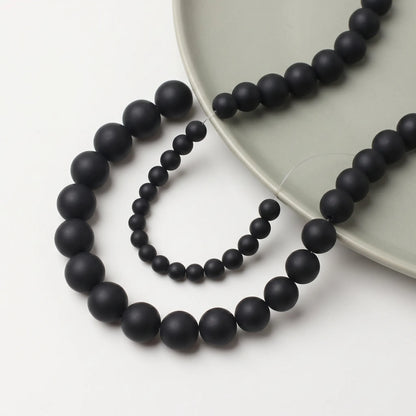 Round matte black onyx beads with smooth matte surface