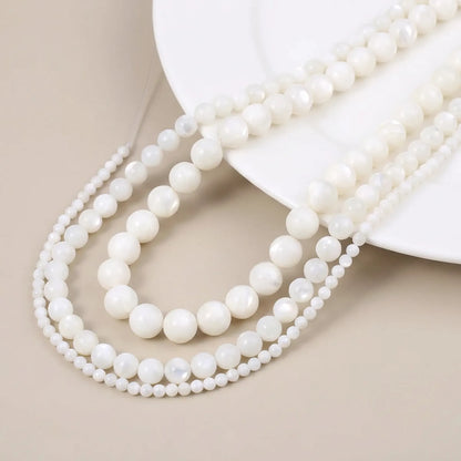 Round mother of pearl beads with smooth shell surface