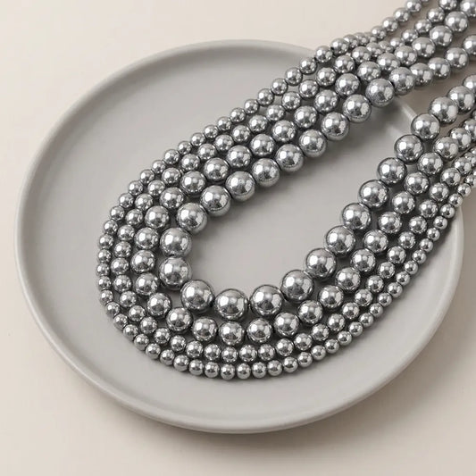 Silver hematite beads round metallic stone strand