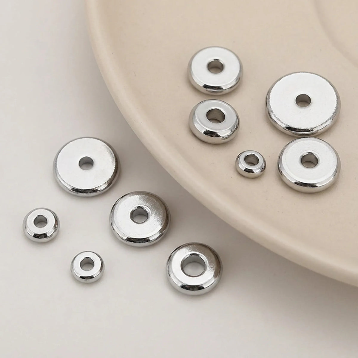 304 stainless steel flat round spacer beads in stainless steel color