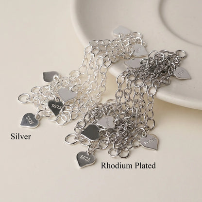 925 sterling silver chain extenders with heart tags shown in plain silver and rhodium plated finishes
