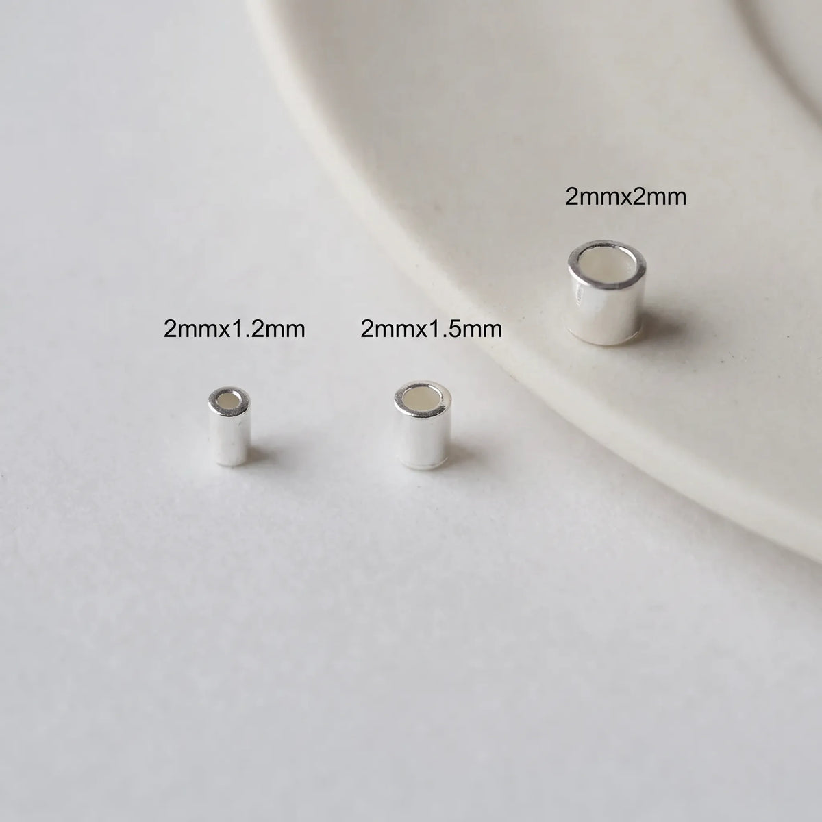 Sterling silver crimp beads in 2x1.2mm, 2x1.5mm and 2x2mm sizes