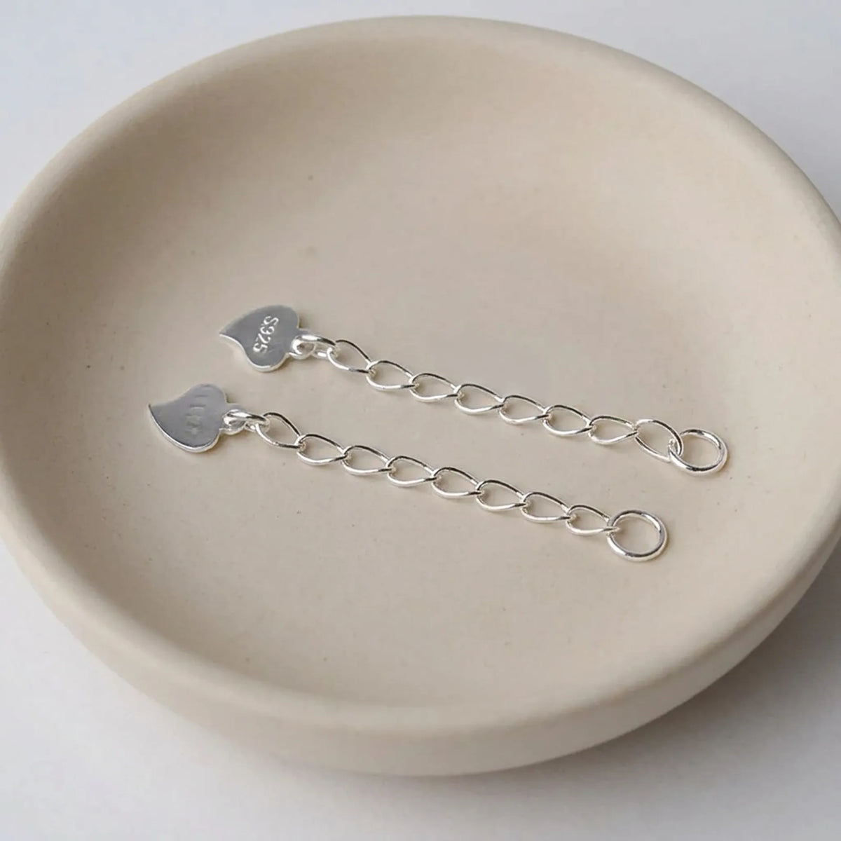 Sterling silver extension chains with twisted oval links and S925 stamped heart tags