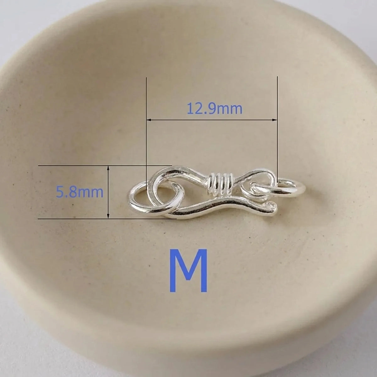 Medium sterling silver S hook clasp measuring approximately 12.9 x 5.8 mm