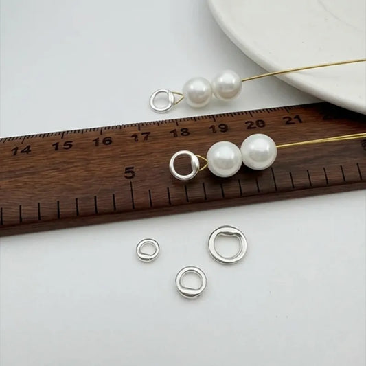 Sterling silver wire guards for finishing beaded bracelets and necklaces