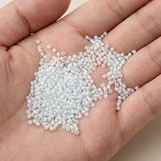 Transparent White Lined Glass Seed Beads 2mm 12/0 Shown in Hand for Size Reference 1000pcs
