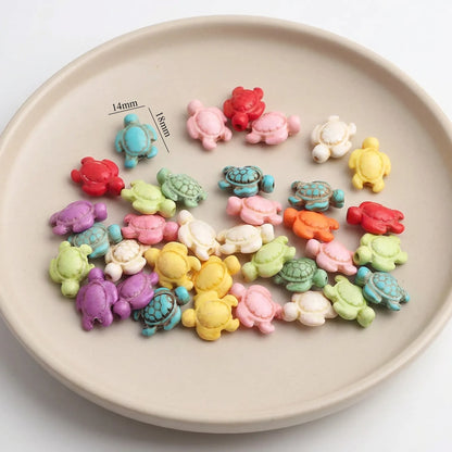 Carved turtle howlite beads measuring 14x18mm in assorted colors