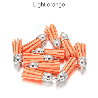 20 pendentifs en cuir vintage avec pompon de 38 mm.