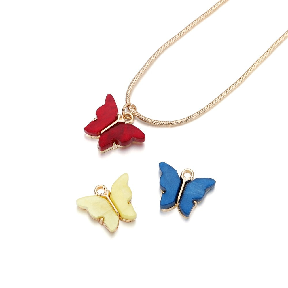 Pendentif papillon en résine colorée, 10 pièces