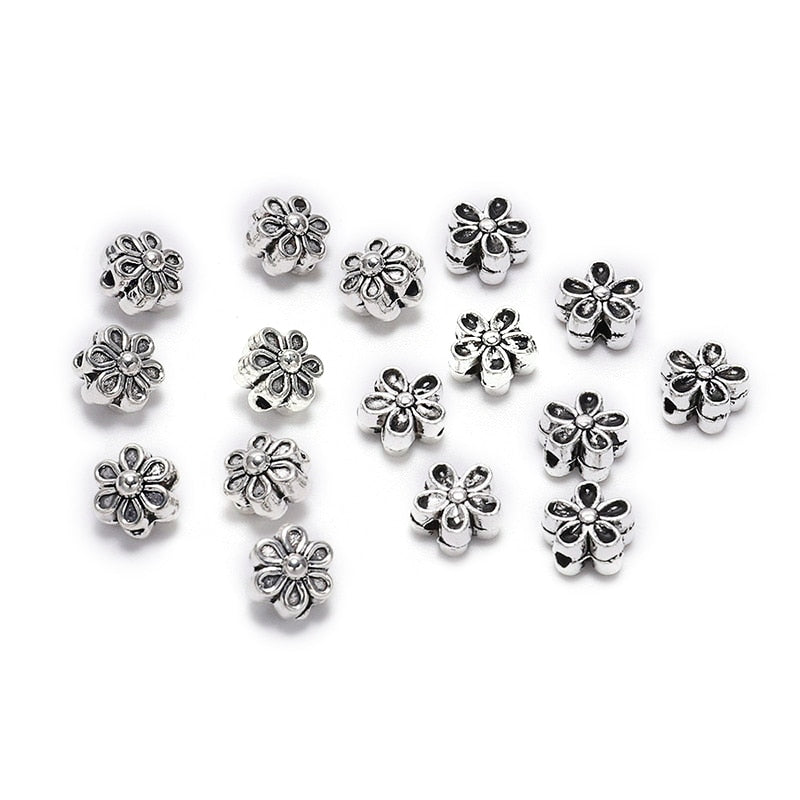 6 mm tibetische antike Spacer-Blumenperle, 50 Stück
