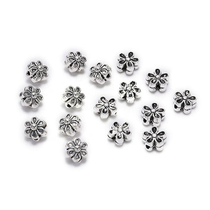 6 mm tibetische antike Spacer-Blumenperle, 50 Stück
