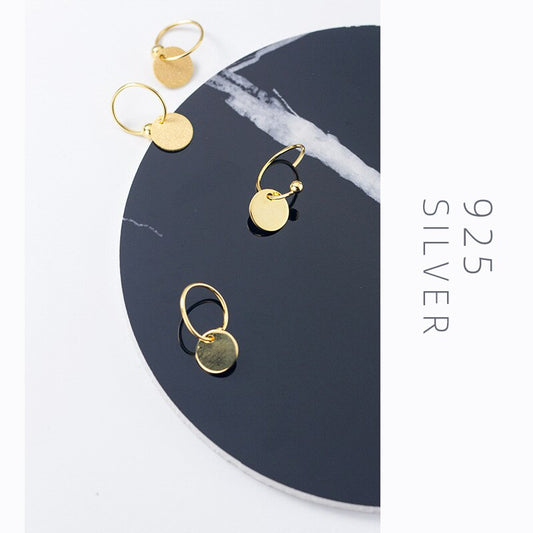 Runde Creolen mit Peelingperlen