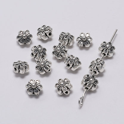 6 mm tibetische antike Spacer-Blumenperle, 50 Stück