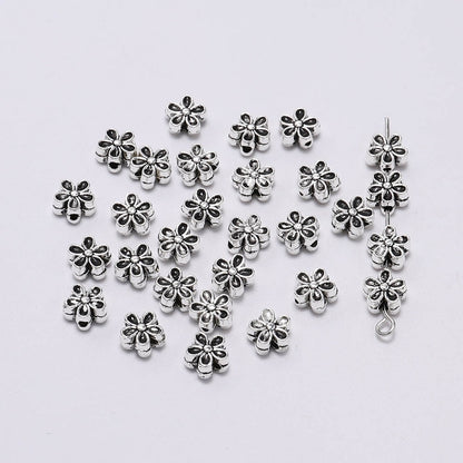 6 mm tibetische antike Spacer-Blumenperle, 50 Stück