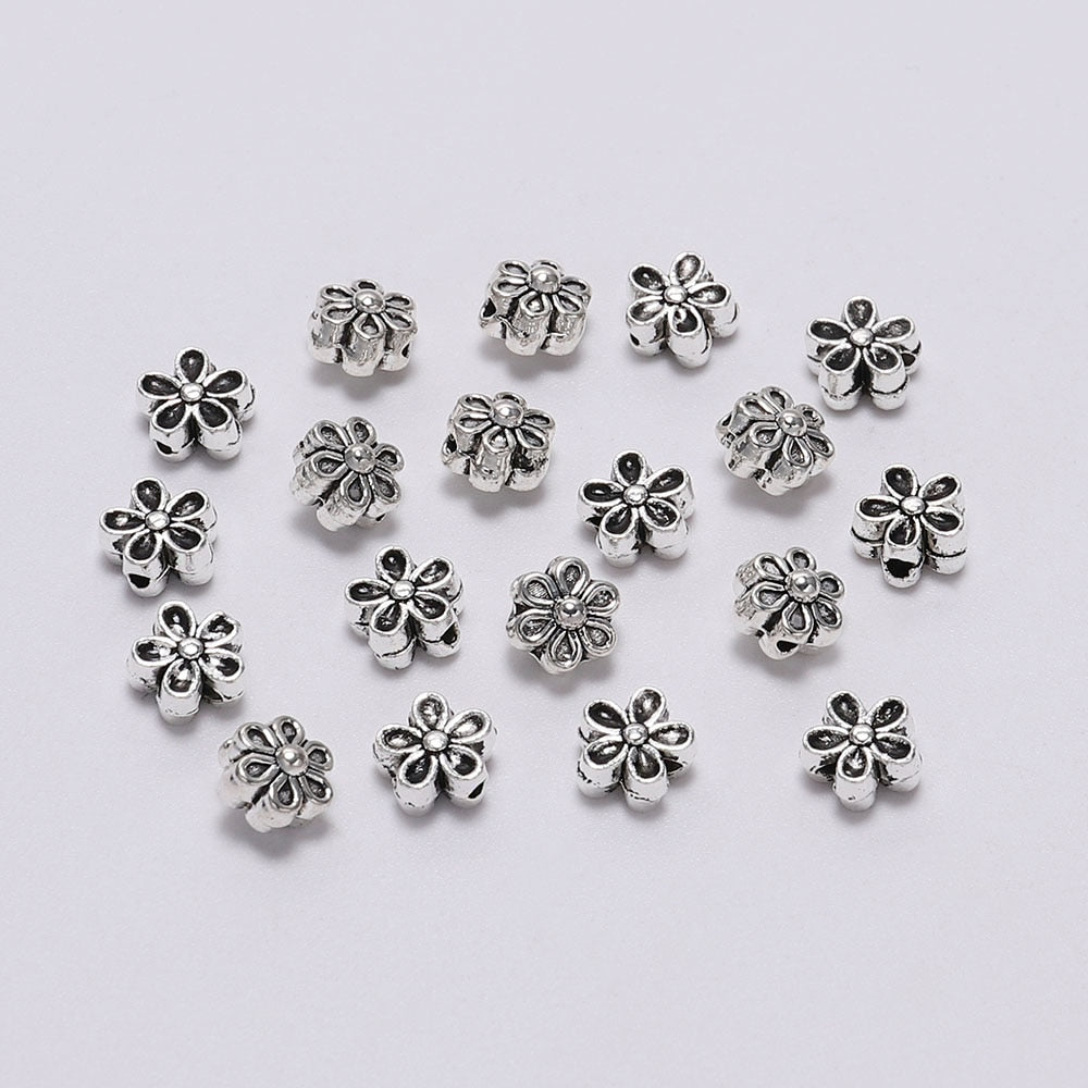 6 mm tibetische antike Spacer-Blumenperle, 50 Stück