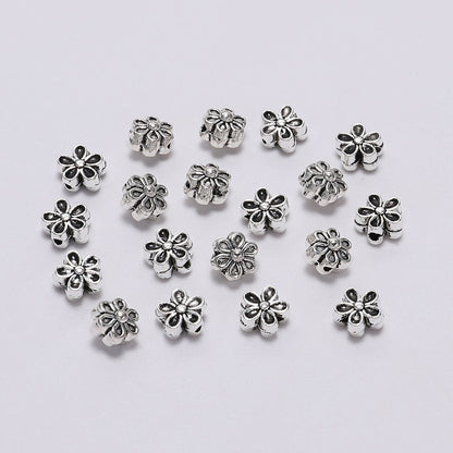 6 mm tibetische antike Spacer-Blumenperle, 50 Stück