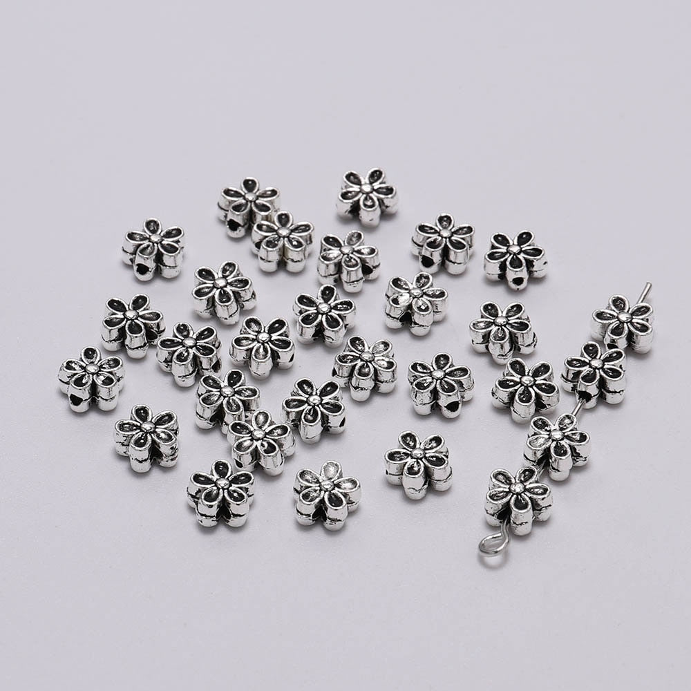 6 mm tibetische antike Spacer-Blumenperle, 50 Stück