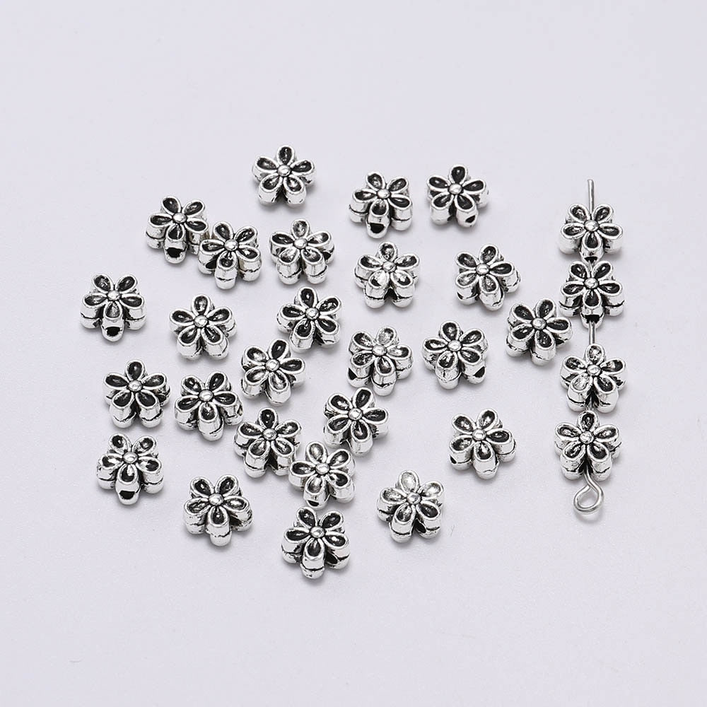 6 mm tibetische antike Spacer-Blumenperle, 50 Stück