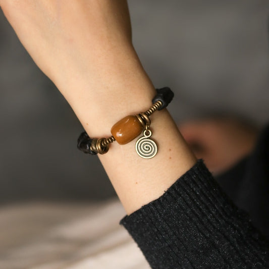carved-ebony-wood-vintage-copper-bracelet.jpg