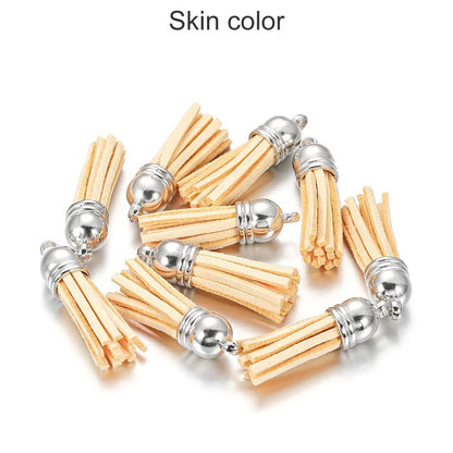 20 pendentifs en cuir vintage avec pompon de 38 mm.