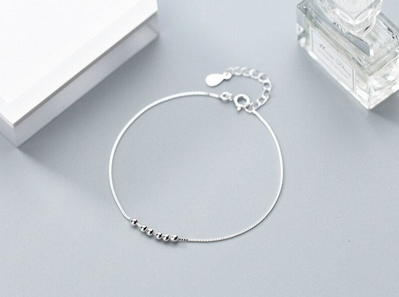 Einfaches Charm-Perlen-Kettenarmband