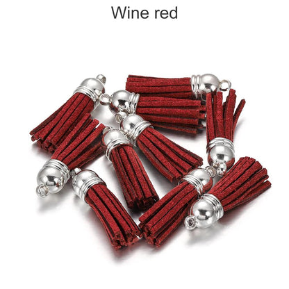20 pendentifs en cuir vintage avec pompon de 38 mm.