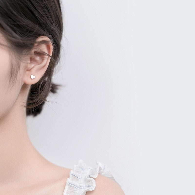 Niedliche kleine Ohrstecker mit Sternen, Herzen und Perlen