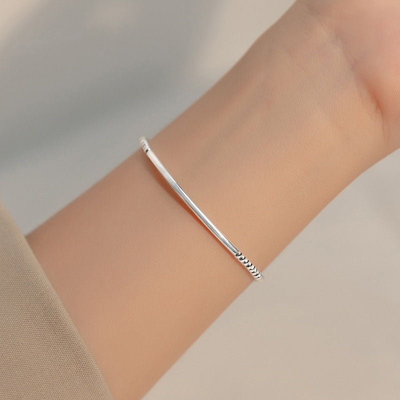 Bracelet réglable plaqué platine avec perles en forme de cœur