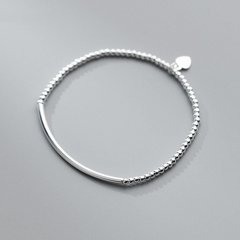 Bracelet réglable plaqué platine avec perles en forme de cœur