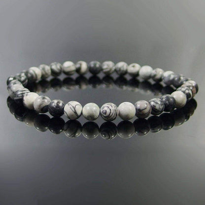 Schwarz-weißes Zebra (Spinnennetz) Jaspis-Edelstein-Stretch-Armband, 4–12 mm 